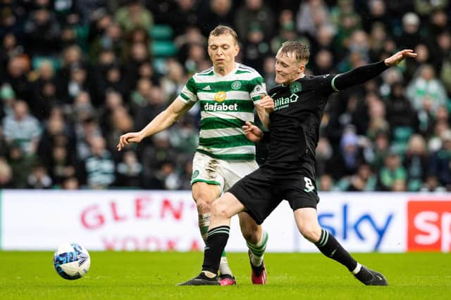 Doyle-Hayes gets stuck in against Celtic's Alistair Johnston at Parkhead