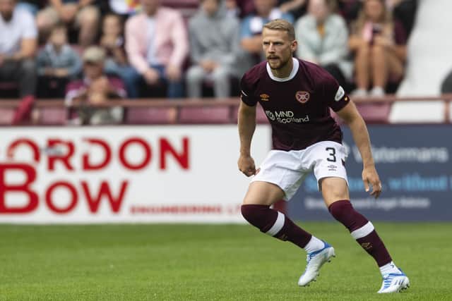 Stephen Kingsley returned from injury for Hearts against Dundee United.