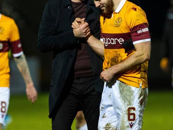Motherwell manager Graham Alexander with Allan Campbell at full-time during a Scottish Premiership match between Ross County and Motherwell. (Photo by Alan Harvey / SNS Group)