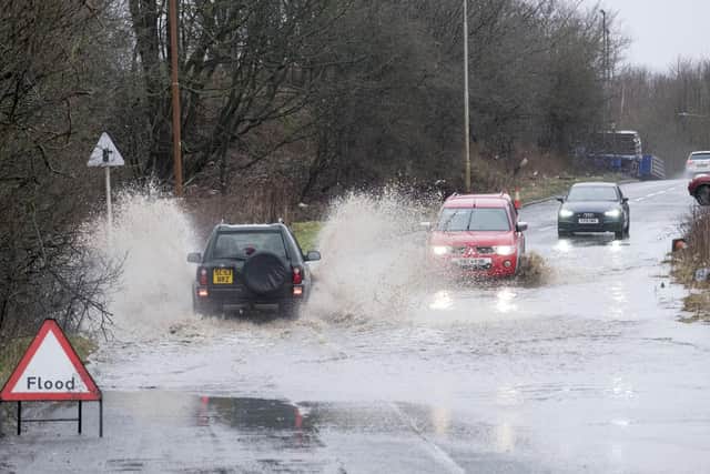 Stock photo of flooding on Clifftonhall road near Newbridge, Edinburgh, in January 2020.