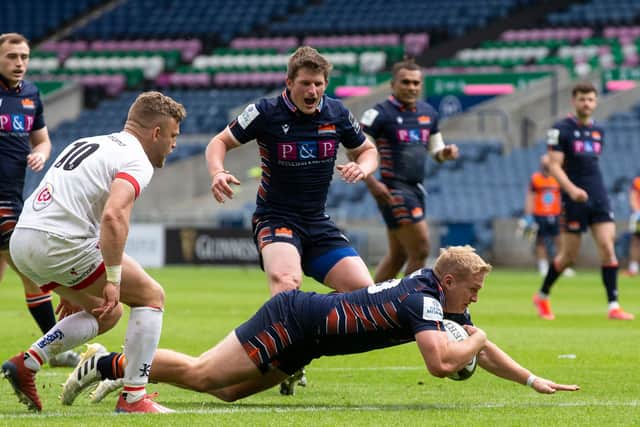 Cameron Hutchison scores on his Edinburgh debut earlier this month in the Rainbow Cup match against Ulster at BT Murrayfield.