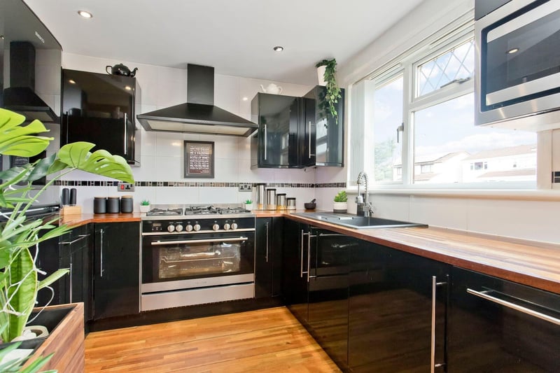 The modern fully fitted kitchen. The property also benefits from CCTV cameras to front and rear, as well as gas central heating and double glazing.