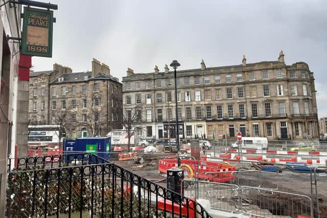 The road works and assorted paraphernalia create a barrier to crossing Leith Walk