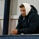 David Goodwillie watches Raith Rovers and Queen of the South play at Stark's Park