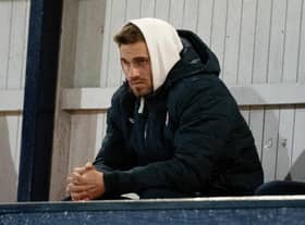 David Goodwillie watches Raith Rovers and Queen of the South play at Stark's Park