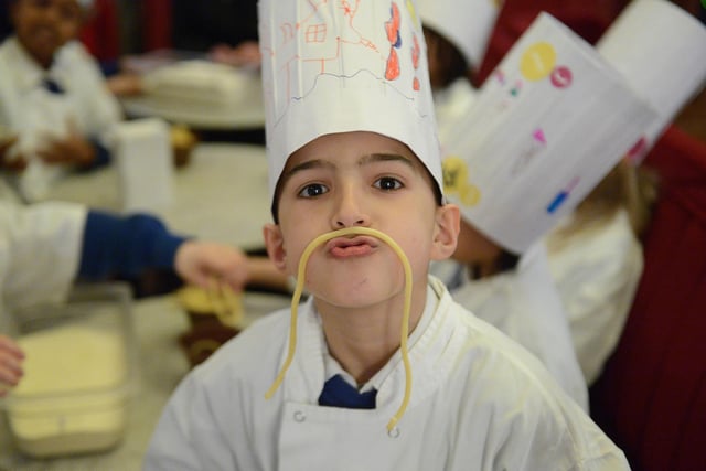 Seven-year-old Romel Nooh from Dalry Primary shows off his pasta moustache at Jamie's Italian Edinburgh at a workshop day for local school pupils in May 2013.