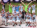 Argentina's players celebrate winning the Fifa World Cup (Picture: Richard Heathcote/Getty Images)