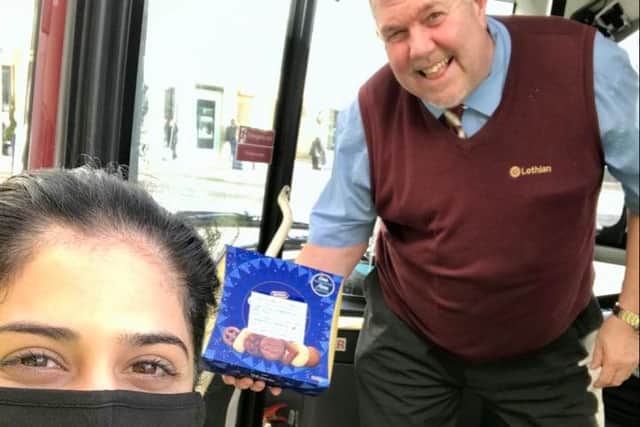 Lothian bus driver Steven receiving a random act of kindness from Nadia