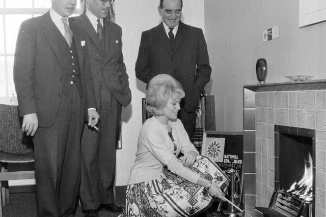 Provost J Quinn opens a Coal Utilisation Council Solid Fuel Show House in Dalkeith in February 1963.