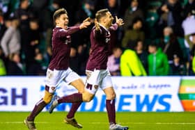 Aaron Hickey and Conor Washington celebrate after the striker's goal in Hearts' 3-1 win against Hibs