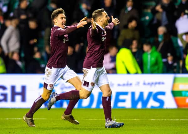 Aaron Hickey and Conor Washington celebrate after the striker's goal in Hearts' 3-1 win against Hibs