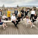 Members of the Muckle Media team pictured against an Edinburgh backdrop.