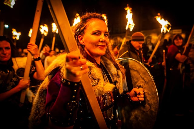 The Torchlight Procession on Friday took a different route to previous years, with the Old Town lit-up by a parade of fire past some of the city most famous landmarks.