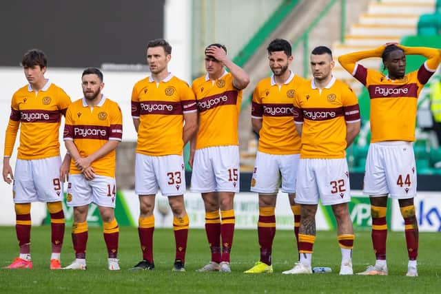 Motherwell's players can't hide their frustration during the shoot-out.