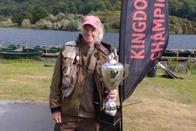 Sam Davies with the Jock Callison Trophy after winning the Kingdom Fly Fishing Championship