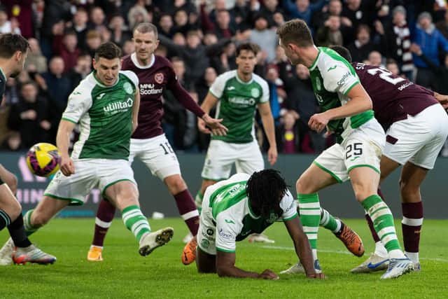 Toby Sibbick sticks the ball in the back of the net against Hibs but the Hearts defender's goal was disallowed for offside. Picture: SNS