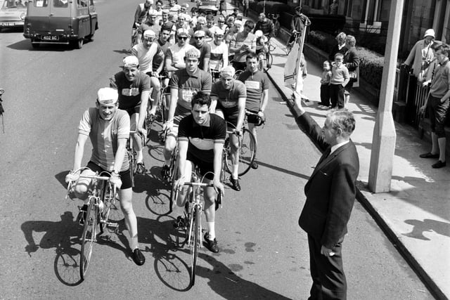 Eddie Jenkinson, sports editor of the Evening News & Dispatch, prepares to set riders off on the final stage of Musselburgh Roads Club's two-day cycle event in May 1966.