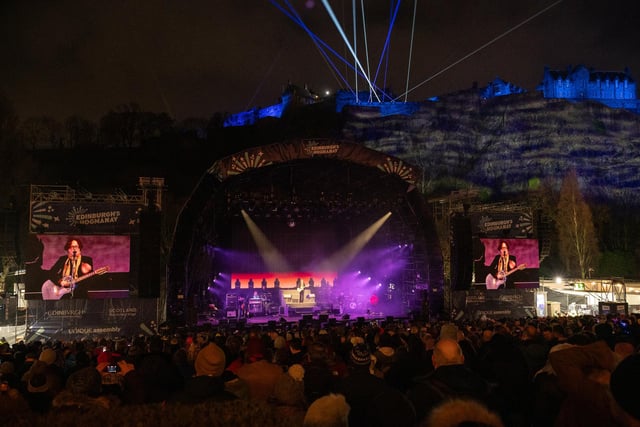 Pulp are pictured on stage at the Ross Bandstand for the Hogmanay Concert in the Gardens with the stunning backdrop of Edinburgh Castle.