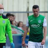 Jamie Murphy leaves the field of play after suffering a recurrence of a hamstring injury against Livingston