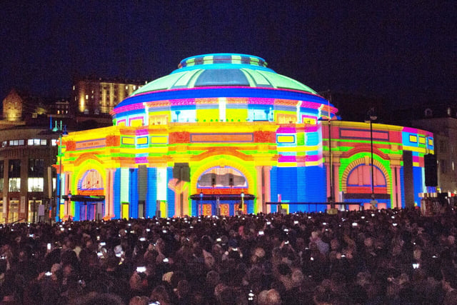 Crowds gathered on Lothian Road as projections lit up the Usher Hall in Edinburgh as the city's famous Fringe festival season got underway in 2018.