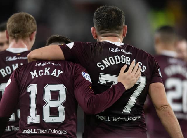 Barrie McKay is congratulated by Robert Snodgrass after scoring what would prove to be the only goal of the game. Picture: SNS