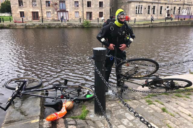 Shane hauled out three bikes during Sunday's dive. Pic: Hilary Thacker/ Friends of Water of Leith Basin.