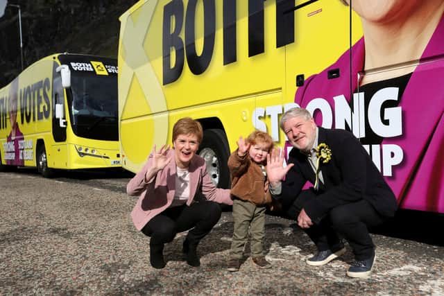 Nicola Sturgeon with Angus Robertson and his daughter Saoirse during campaigning in Edinburgh ahead of the election on Thursday (Picture: Russell Cheyne/PA Wire)