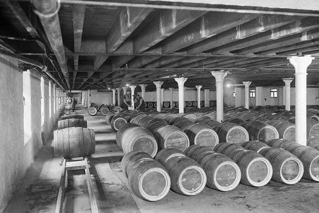 Barrels lined up at Drybrough's Craigmillar (Duddingston)  Brewery. Edinburgh.
