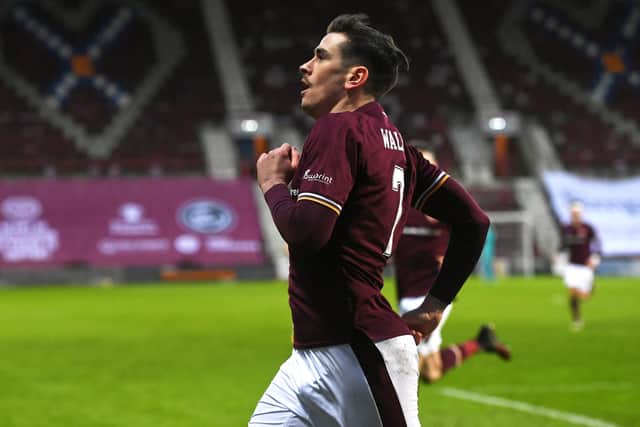 Jamie Walker celebrates after scoring Hearts' winner against Dunfermline.