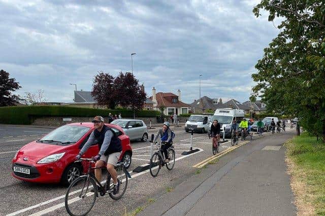 Activists take part in a protest on Lanark Road's cycle lane in June 2021.  Picture: Chris Hill