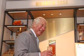 Prince Charles, Prince of Wales, known as the Duke of Rothesay when in Scotland, with a cocktail, during a visit to Johnnie Walker Princes Street to officially open the new global visitor experience on October 01, 2021 in Edinburgh, Scotland. (Photo by Chris Jackson/Getty Images)