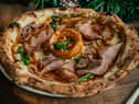 Franco Manca's roast beef Xmas pizza with a Yorkie in the middle