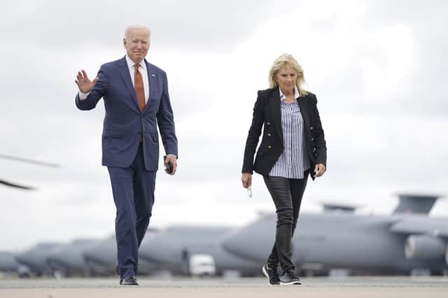 President Joe Biden, pictured here with First Lady Jill Biden, has signalled a new commitment to world co-operation - and Scotland needs to join the table, writes Angus Roberston.