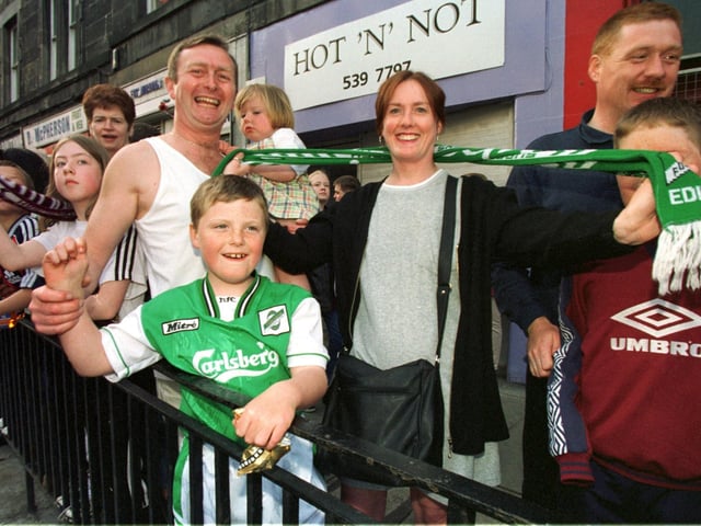 Hibs fans wait for the Hearts team to return to Gorgie Road with the Tennents Scottish Cup in 1998, Michael Palmer 7, mum Carol 36, dad Derek 48, and Stacey 3.
