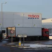 The pay cut plan affects up to 290 staff at Tesco's Livingston distribution depot, which supplies the whole of Scotland