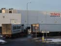The pay cut plan affects up to 290 staff at Tesco's Livingston distribution depot, which supplies the whole of Scotland
