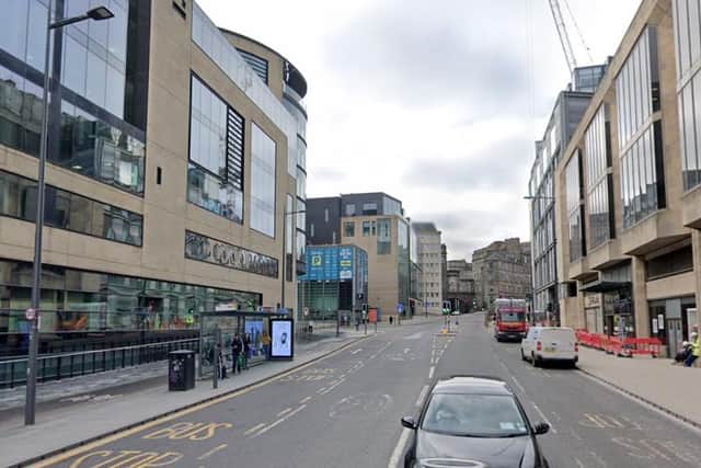 The couple, in their 30s, were assaulted and robbed by a group of thugs in Leith Street at around 9.20pm on Friday.