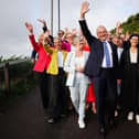 Liberal Democrat leader Ed Davey, centre, arrives with Daisy Cooper, front left, Layla Moran, front right, and parliamentary candidates for the Liberal Democrat conference at the Bournemouth Conference Centre