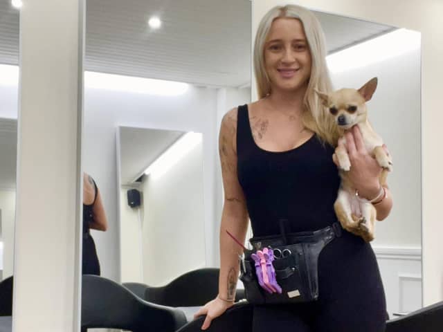 Daisy Beau owner Annie Storrie, pictured at her new Leith salon at Pirrie Street in Edinburgh with Angel, one of Annie's four chihuahuas.