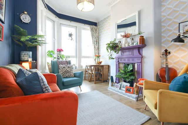 A riot of colour rocks the two-bedroomed property throughout, but the hue and cry is particularly strong in the sitting-dining room, thanks to brilliant light flooding in through its bright bay window