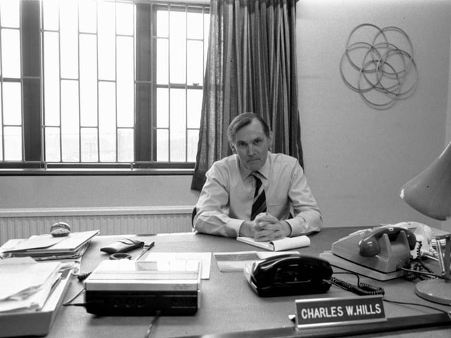Charles Hills, governor of Saughton prison and chairman of the UK Prison Governors' Council, at his desk in his office in May 1984.