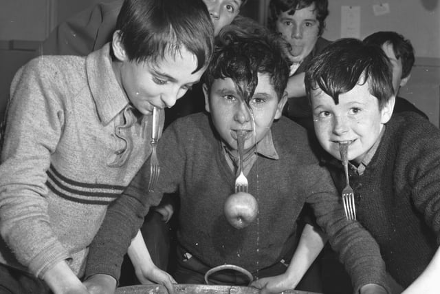 The Tweedie Memorial Boy's Club Hallowe'en party in Edinburgh, showing boys dookin' for apples in 1967.