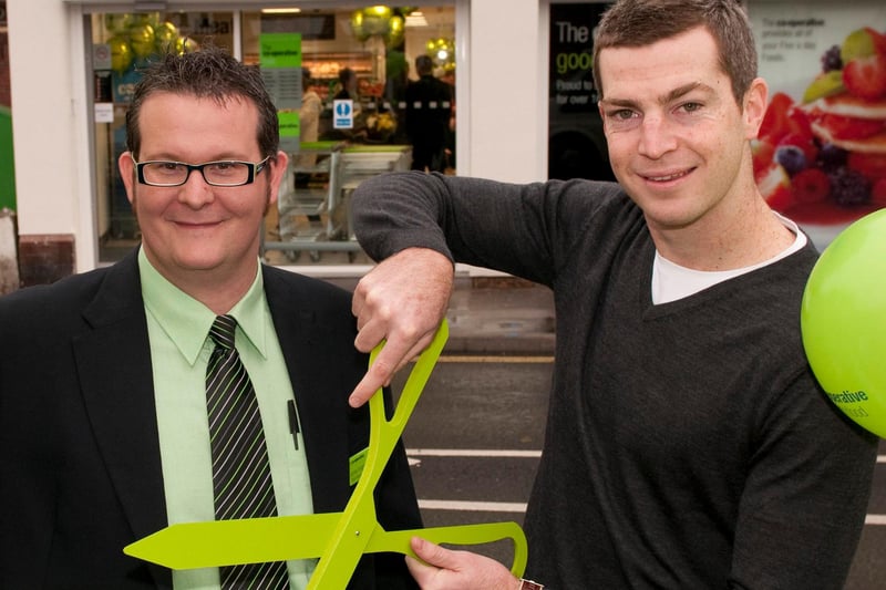 Chesterfield footballer Aaron Downes opens the newly rebranded Midlands Co-op in Hasland Chesterfield, with store Manager James Knight, in 2009