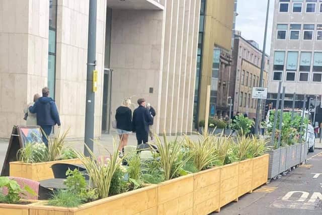The planters are situated outside The Ivy on St Andrews Square