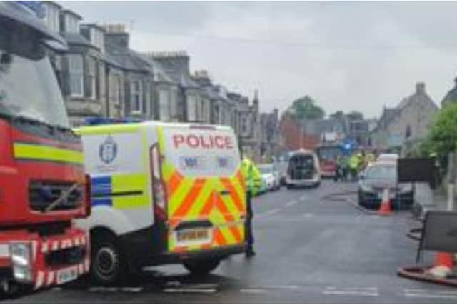 Emergency services were called after an 'explosion' on Dewar Street in Dunfermline on Saturday. Picture: William Scally