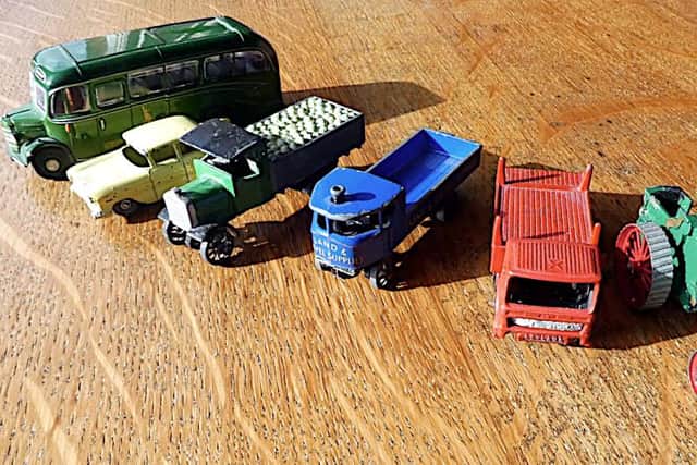Matchbox vehicles are among the toys in the sale
