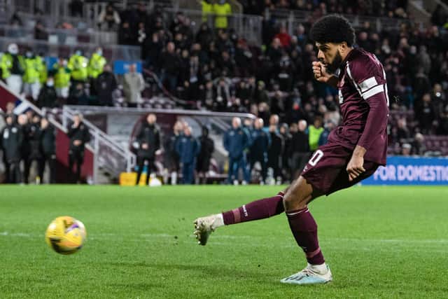 Ellis Simms converts from the spot in the shoot-out against Livingston. He's the only Hearts player to score in the last four games. Picture: SNS