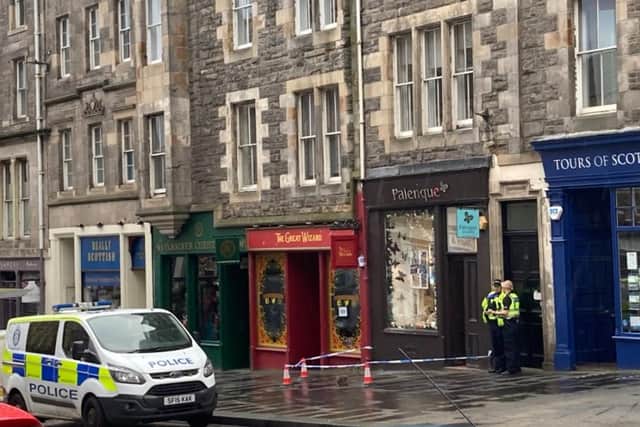 Police cordon in place around shop on Edinburgh's Royal Mile. PIC: Matt Donlan