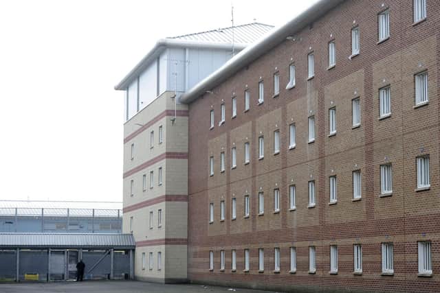 Cells at Edinburgh's Saughton prison - a strike by prison officers would pile pressure on a system already under strain