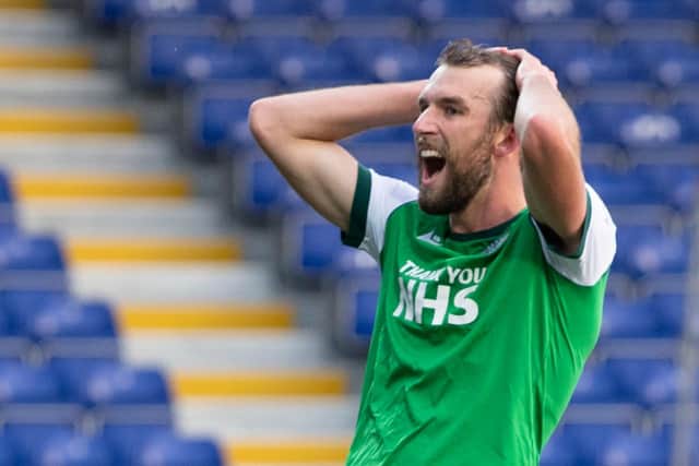 Christian Doidge is frustrated after Hibs miss a late chance against Ross County